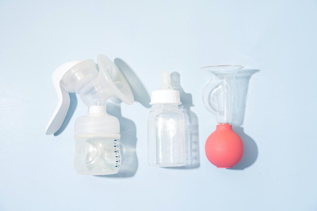 Electric and manual Breast Pump for Breast feeding and bottle with nipple. Pros and Cons of Pumping Before Birth